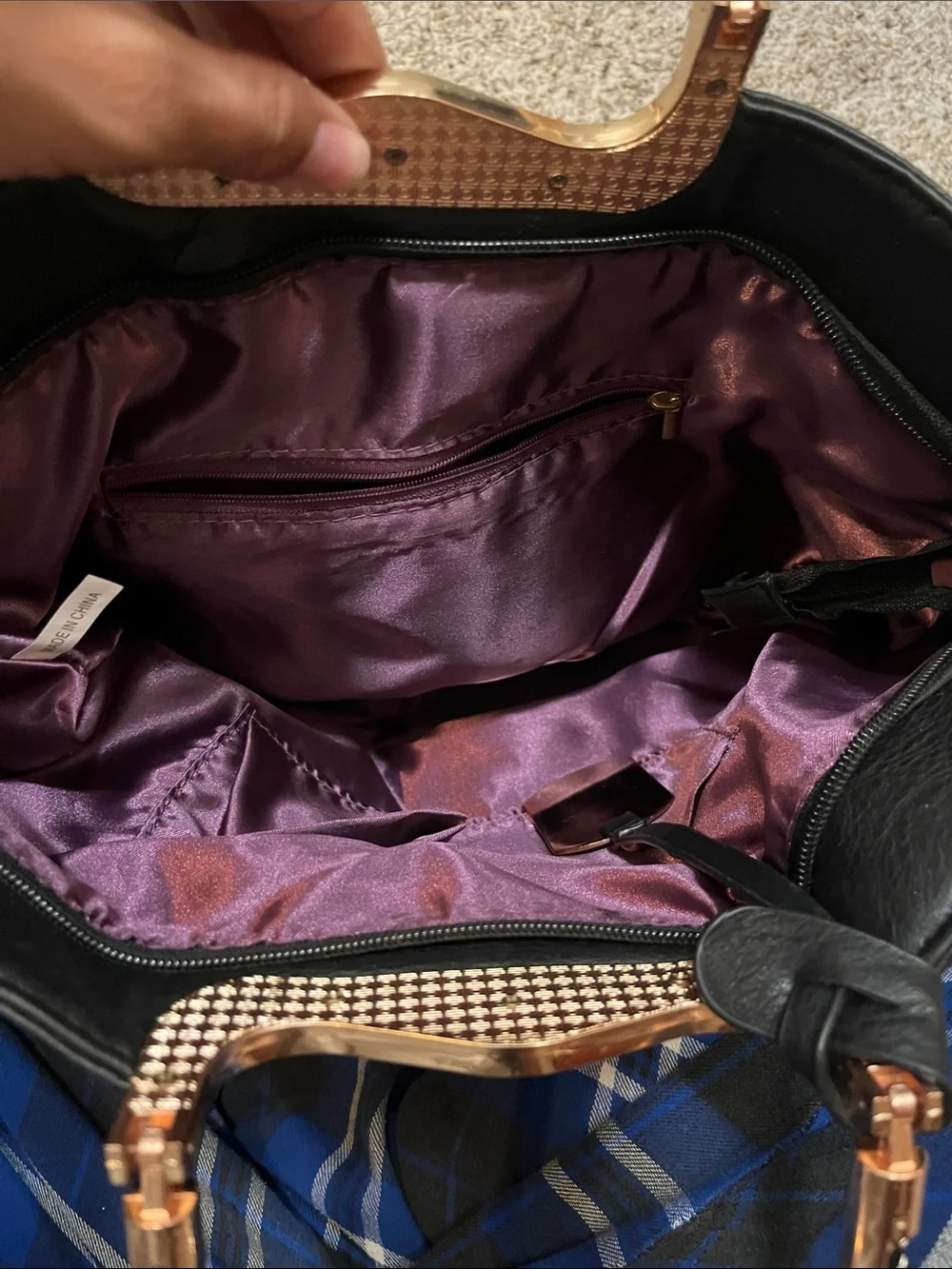 Black bag with gold accents